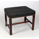 A George III and later mahogany stool