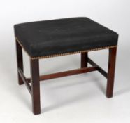 A George III and later mahogany stool