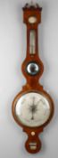 Y An early 19th century faded mahogany wheel barometer