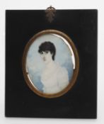 Y Assorted portrait miniatures including an early 19th century miniature of a young woman