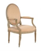 A pale grey painted open armchair in the George III style