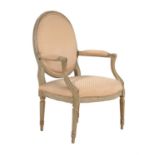 A pale grey painted open armchair in the George III style