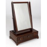 A George II and later mahogany dressing table mirror and another