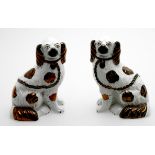 A pair of Staffordshire models of spaniels