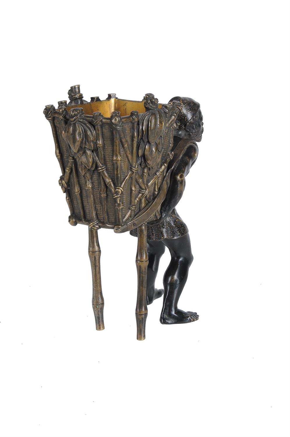 An Austrian bronze figure of an African basket carrier - Image 2 of 2