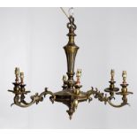 A gilt metal six light chandelier in the Louis XVI taste