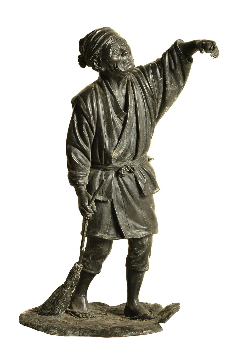 A Japanese bronze figure of a farmer