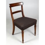 A set of four late Regency mahogany dining chairs