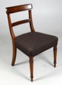 A set of four late Regency mahogany dining chairs