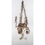 A Continental painted wrought metal three light chandelier