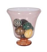 A rose glass table vase with eight ceramic lacquer eggs