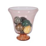 A rose glass table vase with eight ceramic lacquer eggs