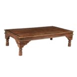 A large Indian hardwood and brass mounted coffee table