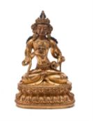 A Tibetan gilt bronze model of Vajrasattva