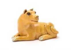 A Chinese export yellow-glazed model of a dog