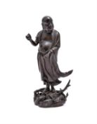 A Chinese bronze figure of Damo