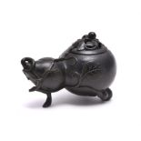 A Chinese bronze double-gourd shaped censer and cover