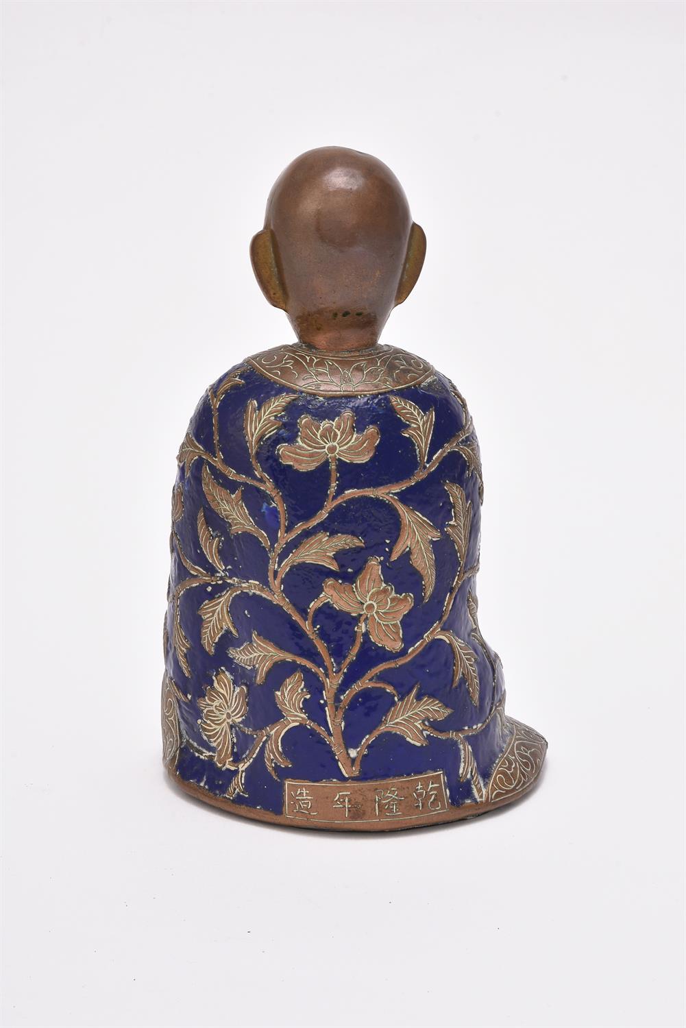 A Chinese gilt bronze and champlev enamel figure of luohan - Image 2 of 4