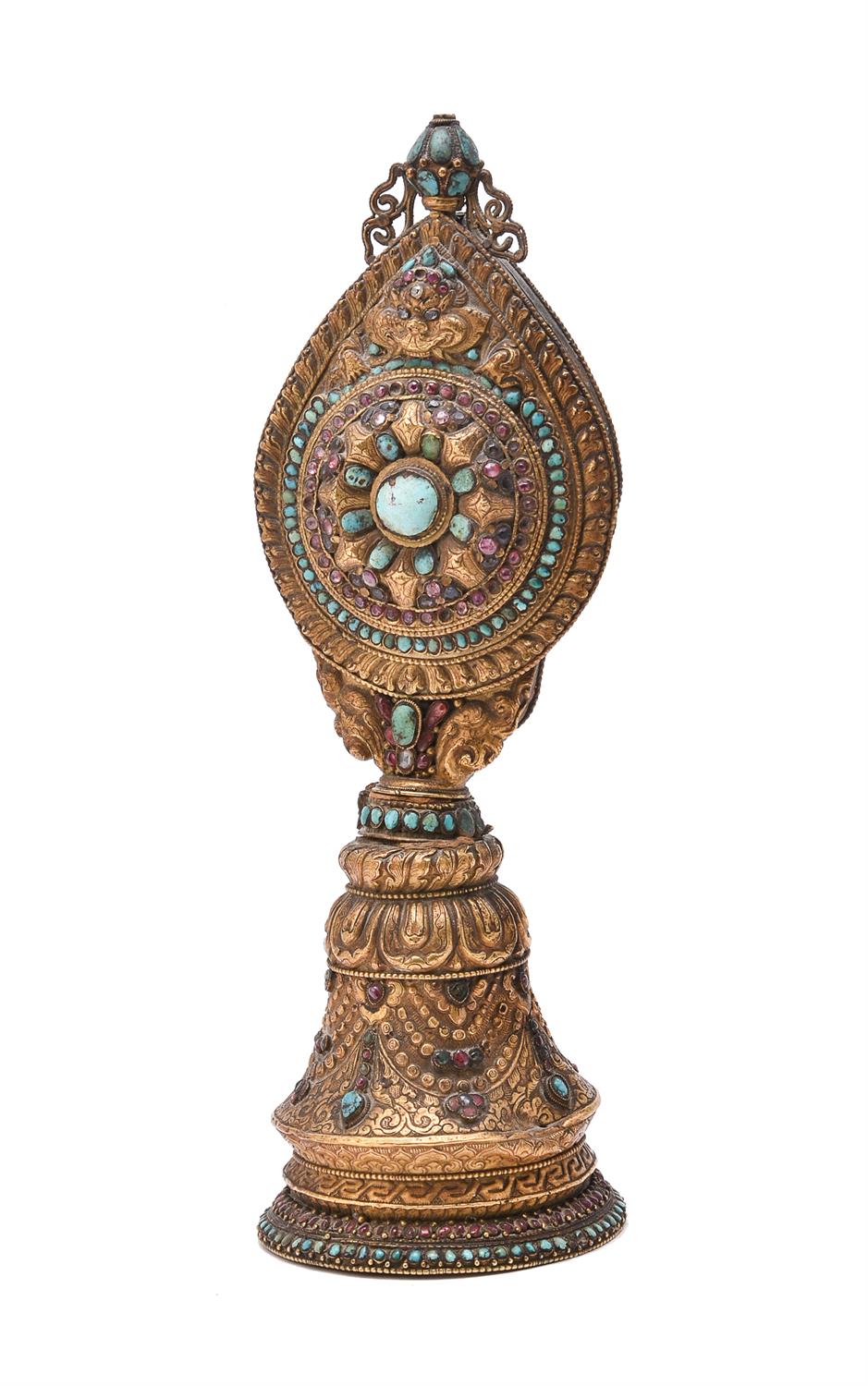 A copper gilt repoussé Buddhist altar ornament