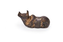 A Chinese gilt bronze paper weight of a rhinoceros