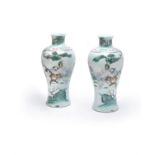 A pair of Chinese Famille Rose 'Taming the Tiger' vases