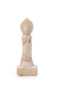 A small white marble Buddhist stele