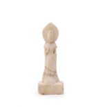 A small white marble Buddhist stele