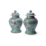 A pair of Chinese turquoise-ground Famille Rose vases