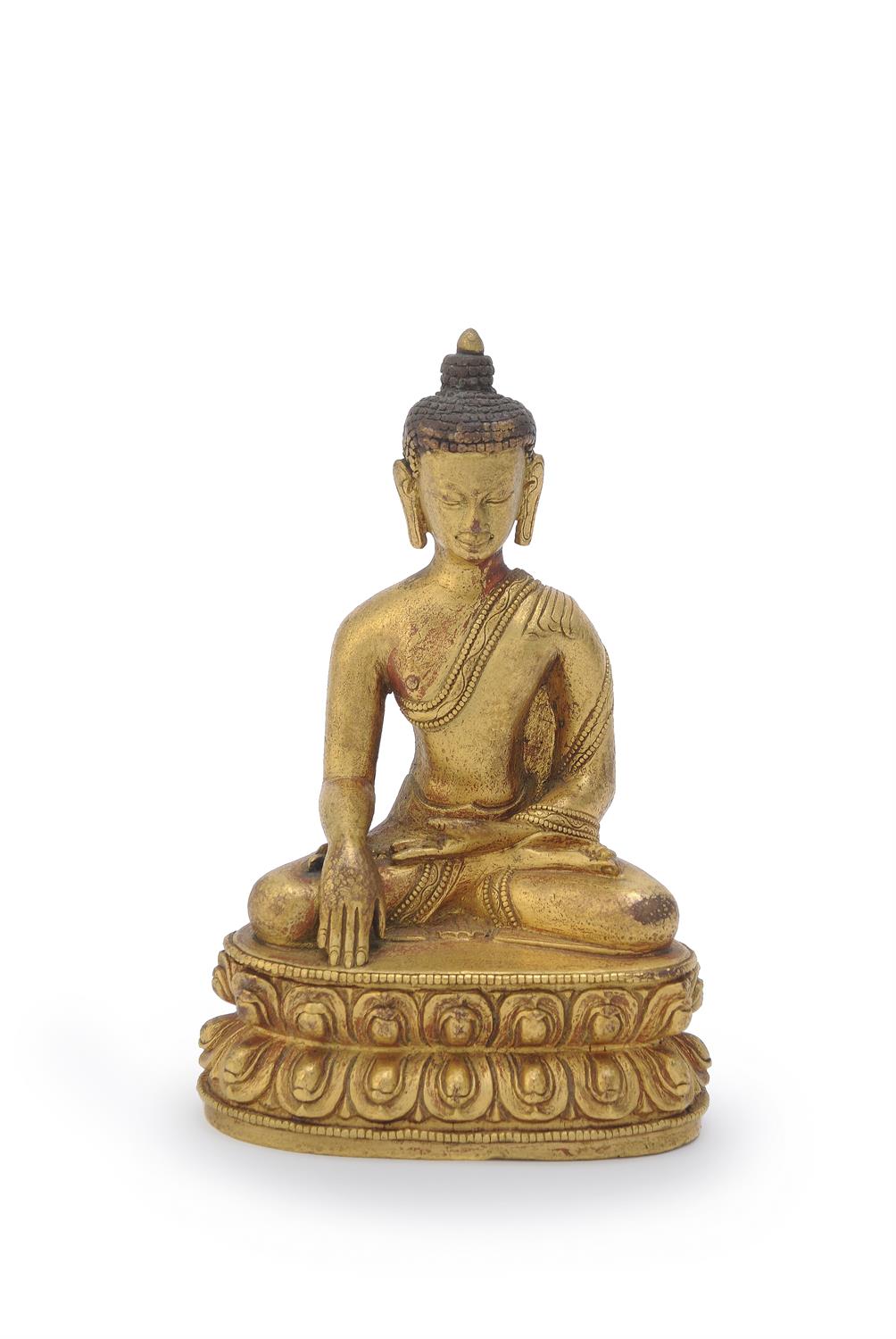 A Sino-Tibetan gilt-bronze Buddha