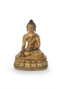 A Sino-Tibetan gilt-bronze Buddha