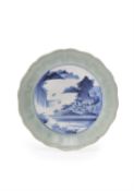 A Japanese Arita blue and white and celadon Dish