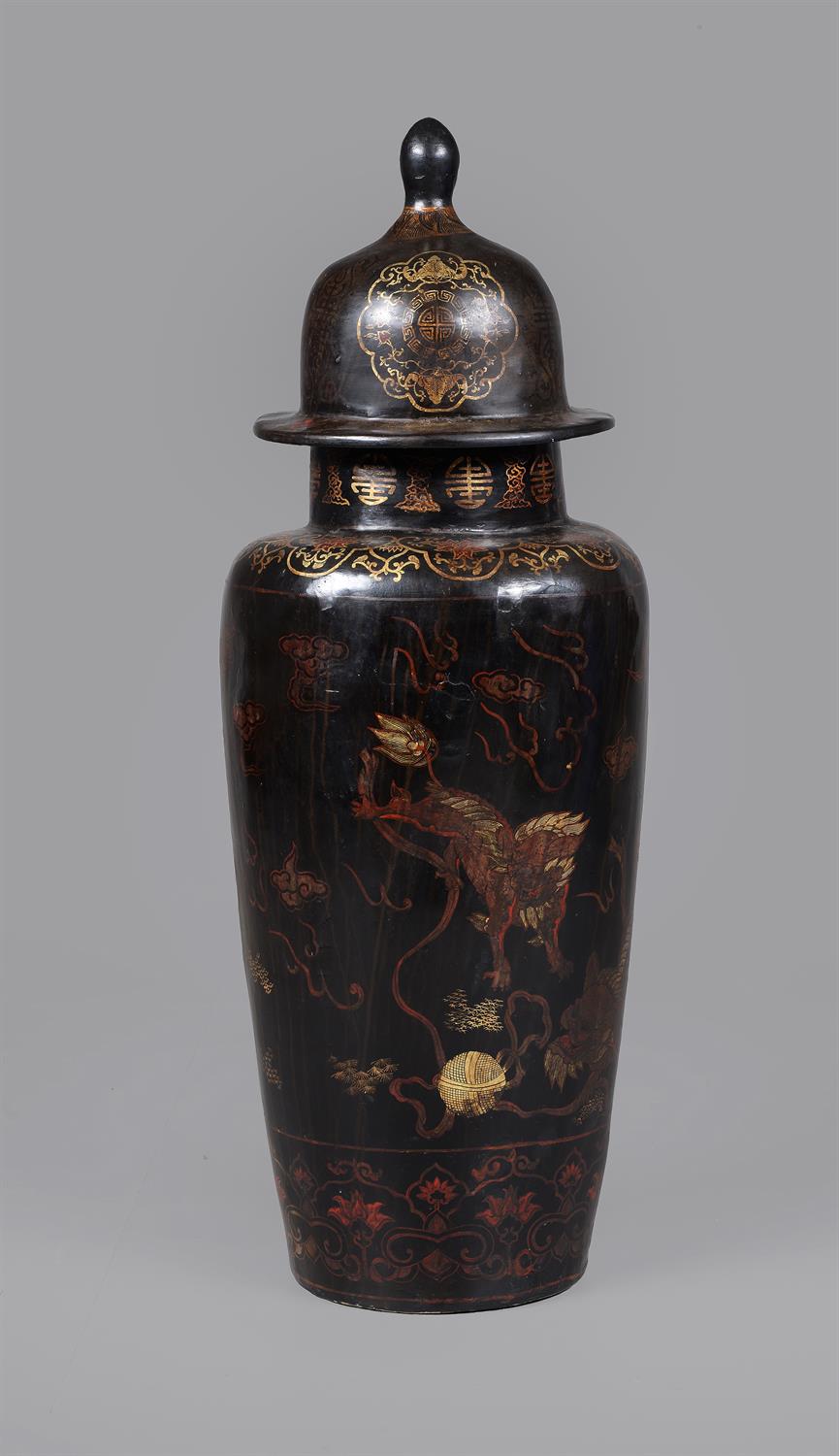 A large Chinese lacquered papier-mâché vase and cover