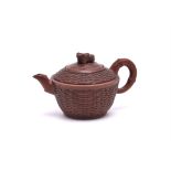 A small Chinese basket-form yixing teapot