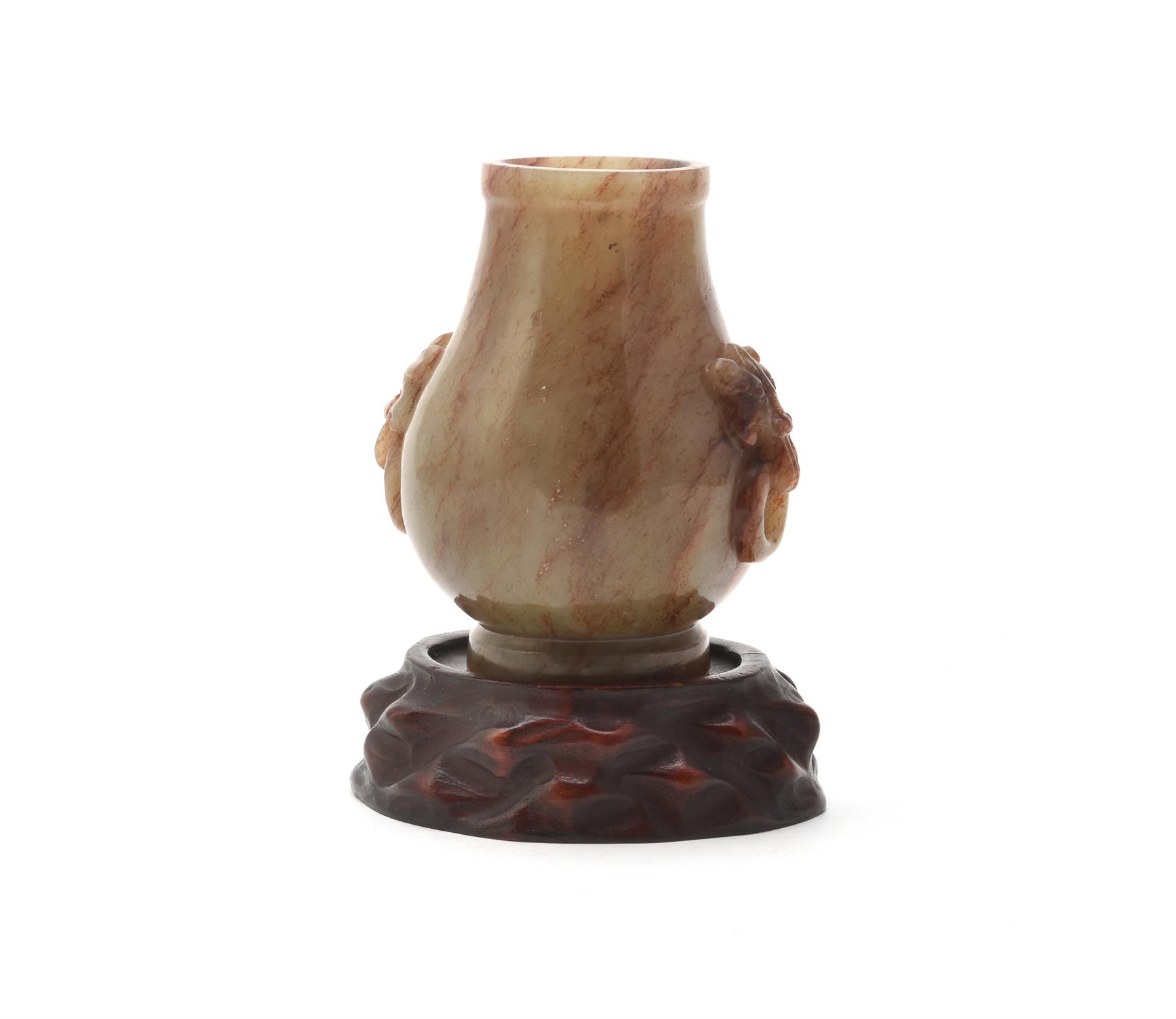 A Chinese jade hu-form vase