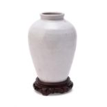 A white glazed stoneware vase