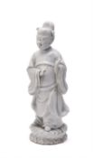 A dehua figure of a standing official