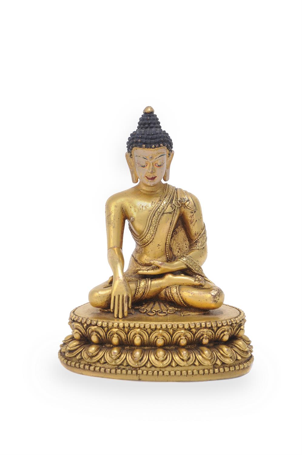 A Sino-Tibetan gilt-bronze figure of Buddha