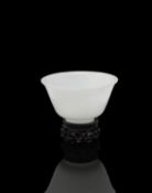 A Chinese opaque white Peking glass bowl