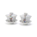 A pair of Chinese famille rose tea bowls and trays