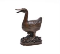 A Chinese bronze duck-form censer and cover