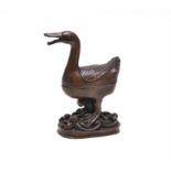 A Chinese bronze duck-form censer and cover