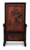 A Chinese carved wood table screen