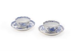 A pair of Chinese blue enamel decorated hexagonal lobed tea bowls and saucers