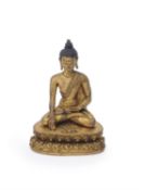 A Sino-Tibetan gilt-bronze figure of Buddha