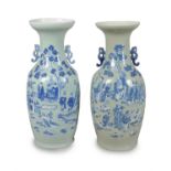 A pair of large Chinese celadon-ground blue and white baluster vases