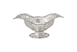 A large silver shaped oval pedestal basket by Edward Barnard & Sons