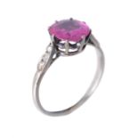 An early 20th century pink sapphire and diamond ring