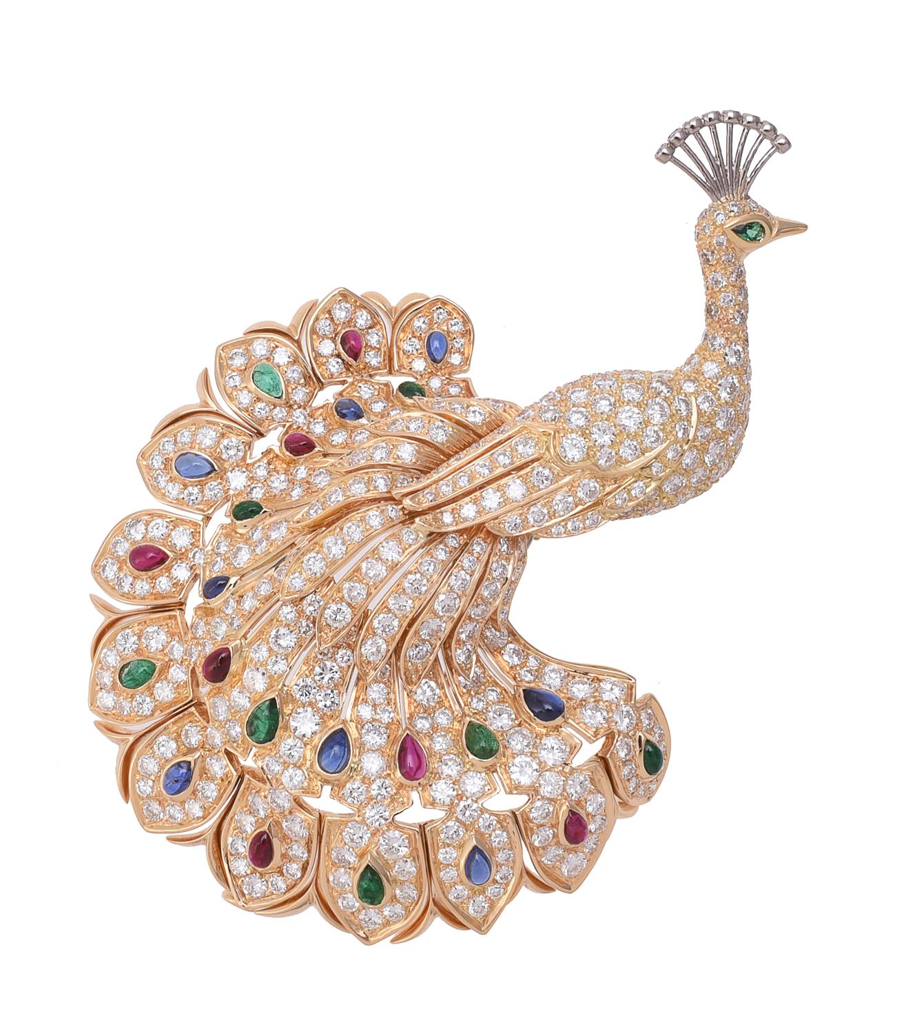 A diamond, sapphire, ruby and emerald peacock brooch by Cartier, the ...