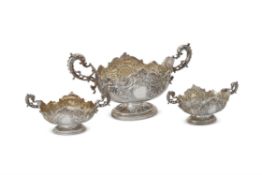 A suite of three late Victorian silver twin handled oval baskets by Walter & John Barnard