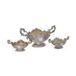 A suite of three late Victorian silver twin handled oval baskets by Walter & John Barnard